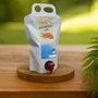 1000 ml bio homoktövis velő egy fa körlapon a szabadban.