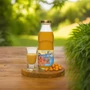 500 ml bio homoktövis velő egy fa körlapon a szabadban.