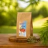 50g levél herba homoktövis tea egy fa körlapon a szabadban.