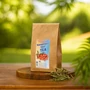 50g levél herba homoktövis tea egy fa körlapon a szabadban.